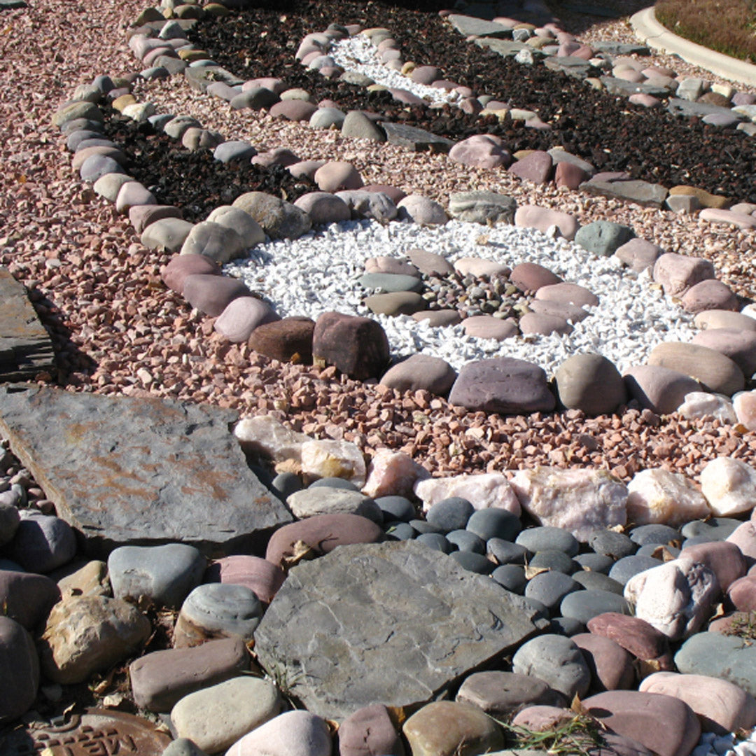 Decorative stone pathway with a central white gravel area