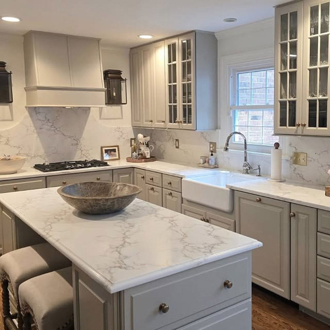 Modern kitchen with marble island, countertops and backsplash