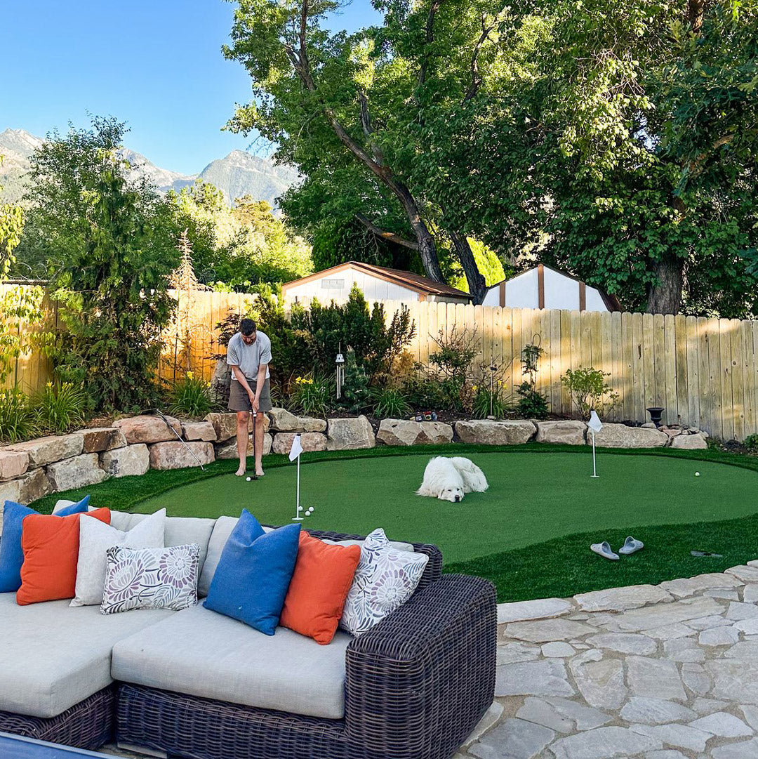 Stone patio with an artificial turf mini golf course